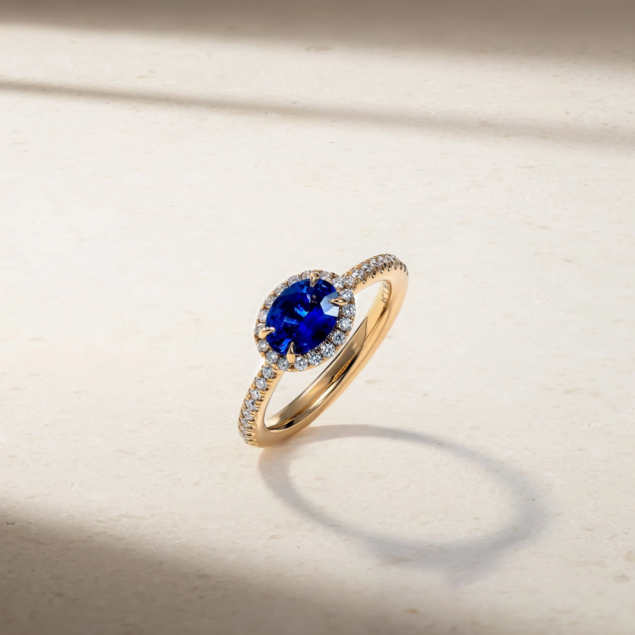 East-West Sapphire and Diamond Halo Ring - Image 3