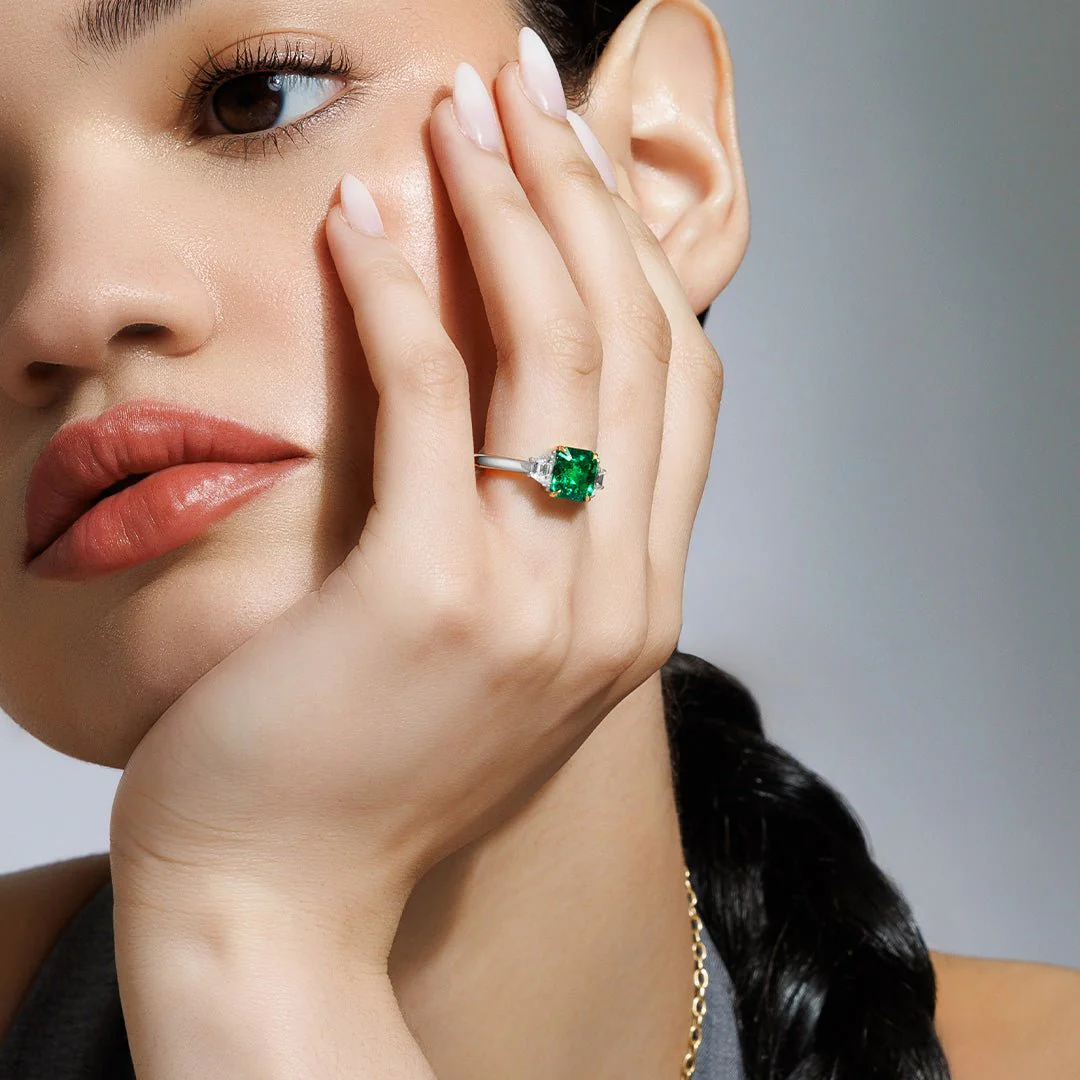 Nouveau Two Tone Three Stone Octagonal Emerald and Diamond Ring - Image 2