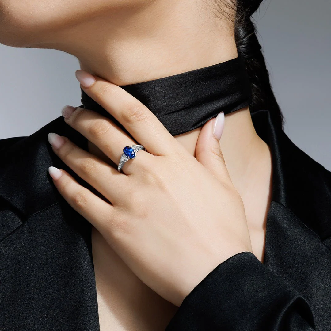 Silky Three Stone Sapphire and Diamond Ring - Image 2