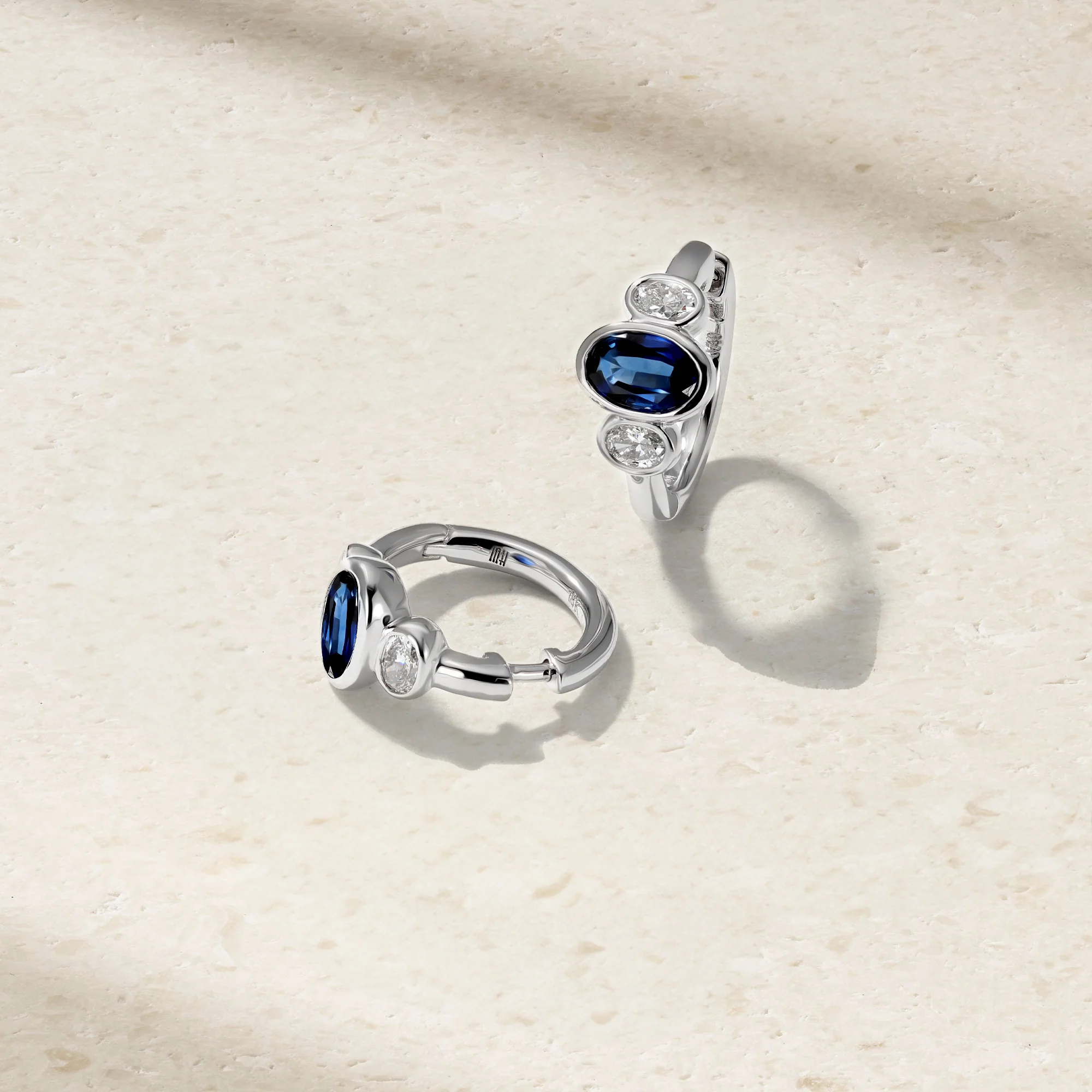 Three Stone Oval Sapphire and Diamond Huggie Earrings - Image 3